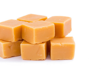 Tasty toffees on a white background.