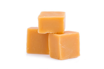 Tasty toffees on a white background.