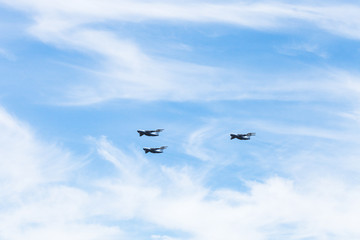 military transport aircrafts in white clouds