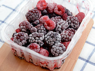 mixed berries in plastic box