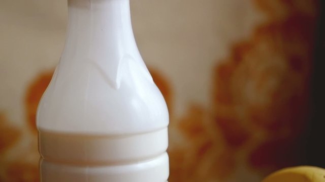 Slowmotion. Healthy breakfast on the table close up with cup of