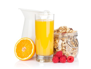 Healty breakfast with muesli, berries and orange juice