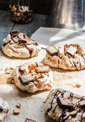 meringue with chocolate and caramel, sweet dessert, selective fo
