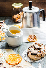 french vanilla meringue with chocolate and caramel, orange tea