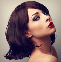 Fototapeta premium Beautiful makeup profile of black hair woman. Closeup vintage po
