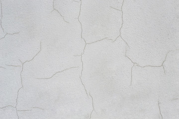 white plaster with cracks
