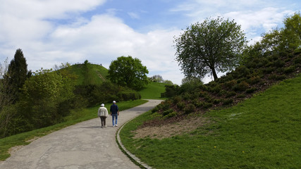 Couple on the way up to the Olympic mountain in Munich, Germany