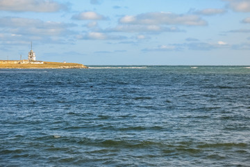 Abandoned lighthouse at the entrance to the bay