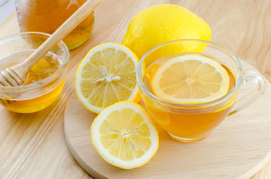 Honey lemon tea on wooden table
