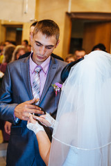 Wedding ceremony. Registry office. A newly-married couple signs