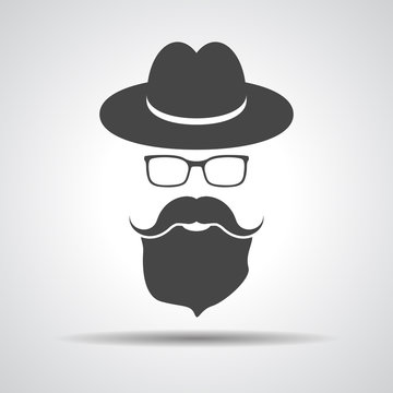 black hat with mustache, beard and glasses isolated on a grey ba