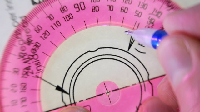Designer measures the angle of the red protractor