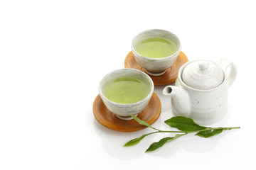 Japanese green tea and fresh green tea leaves