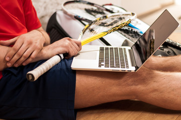 Squash rackets and comuter - Stock Image