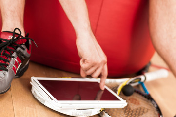 Squash rackets and mobile device - Stock Image