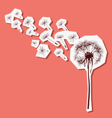 silhouette of dandelion in the wind