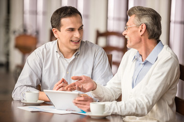 Businessmen in cafe