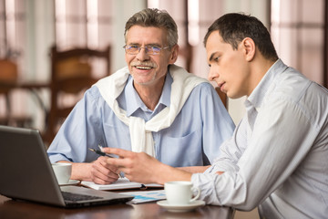 Businessmen in cafe