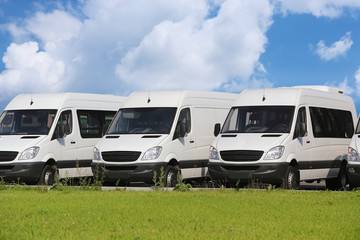 minibuses and vans outside