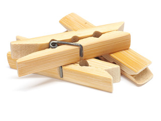 Wooden clothes pin isolated on white background