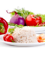boiled rice on white plate with vegetables and prawn 