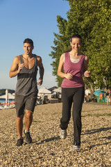 Couple jogging together outdoors