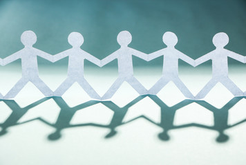 Group of people holding hands