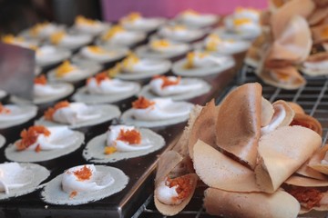 close up of thai crispy pancake - cream crepes