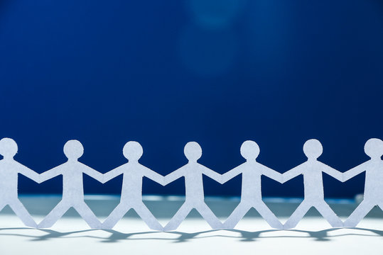 Group of people holding hands
