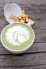 Green tea with milk and crackers delicious