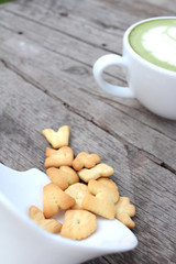 Green tea with milk and crackers delicious
