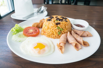 Thai American fire rice on wood table