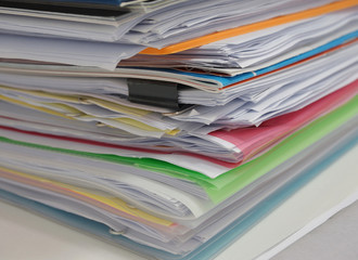 Pile of document on desk