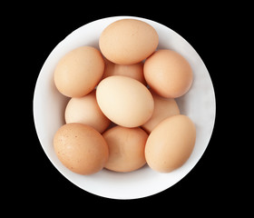 en eggs in a white bowl