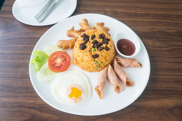 Thai American fire rice on wood table