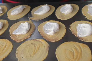 close up of thai crispy pancake - cream crepes