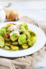 Brussels sprouts roasted with sauce on a plate