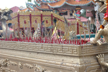 joss stick pot with dragon sculpture in the temple