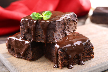 Delicious chocolate cakes on table close-up