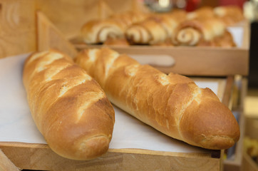 French baguettes on wooden basket