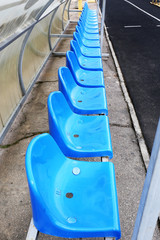 Empty blue seats in stadium