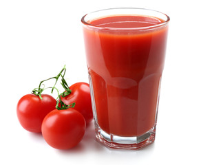 Glass of tomato juice with vegetables isolated on white