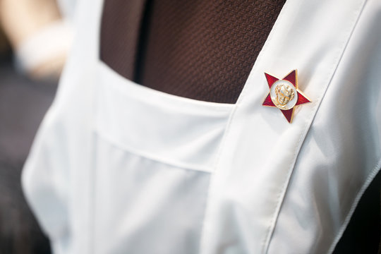 Octobrist Star on the Soviet school uniform