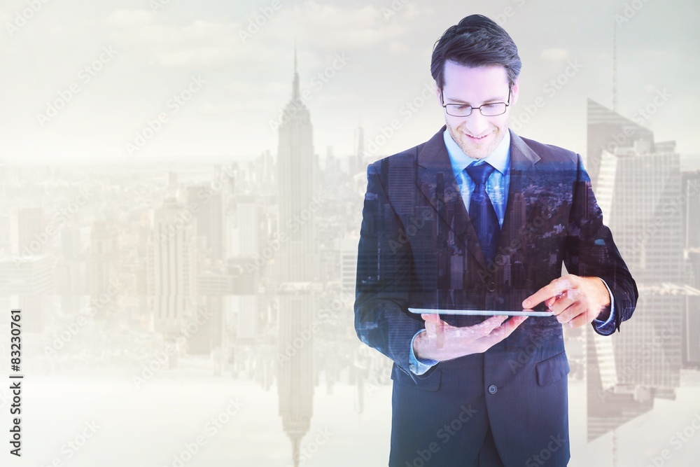 Aufkleber Composite image of businessman standing while using a tablet pc
