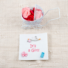 Baby card - Its a girl theme. Pram full of flowers on white
