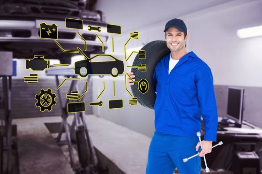 Composite image of confident mechanic carrying tire