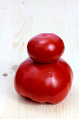 tomatoes on wooden background