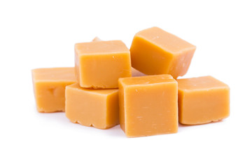 Tasty toffees on a white background.