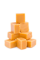 Tasty toffees on a white background.