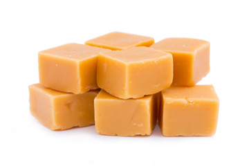 Tasty toffees on a white background.